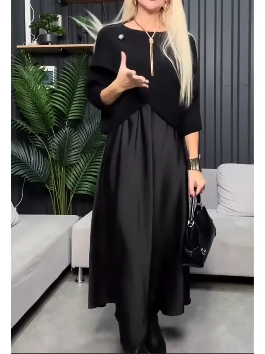 Conjunto de duas peças para menina composto por uma camisola de malha e um vestido de cetim.