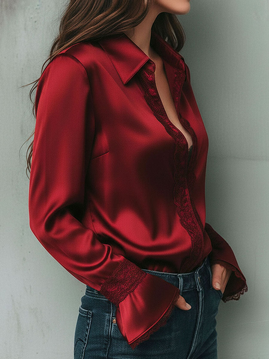 Uma elegante blusa de cetim cor de vinho com mangas largas e detalhes em renda 2025