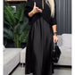 Conjunto de duas peças para menina composto por uma camisola de malha e um vestido de cetim.