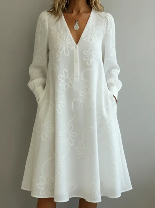 Vestido vintage elegante com decote em V e bordados florais
