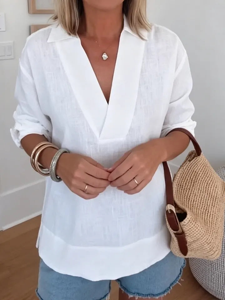 Blusa de algodão e linho com decote em V, minimalista e aconchegante